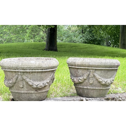 211 - GARDEN PLANTERS,  a pair, well weathered reconstituted stone each round with swag decoration, 35cm H... 