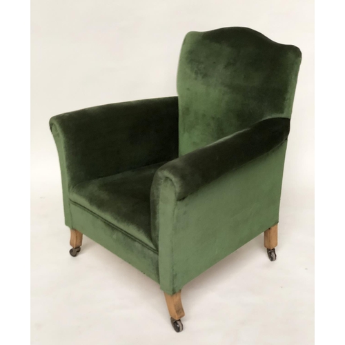 215 - ARMCHAIR, early 20th century Edwardian green velvet upholstered with scroll arms and outswept suppor... 