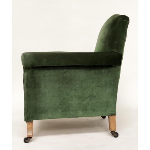 215 - ARMCHAIR, early 20th century Edwardian green velvet upholstered with scroll arms and outswept suppor... 