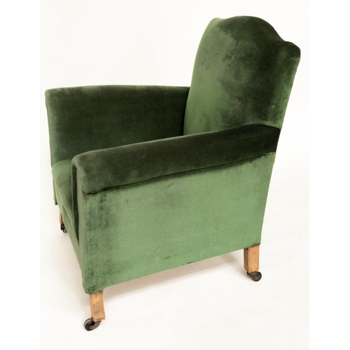 215 - ARMCHAIR, early 20th century Edwardian green velvet upholstered with scroll arms and outswept suppor... 