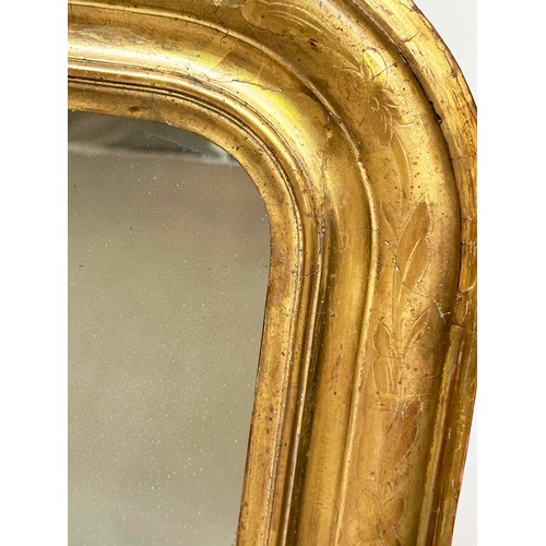 212 - WALL MIRROR, late 19th century French giltwood with arched incised frame, 67cm W x 99cm H.