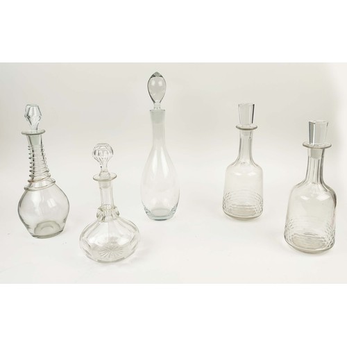 20 - COLLECTION OF ASSORTED DECANTERS, comprising a pair of early 20th century decanters, a spiral twist ... 