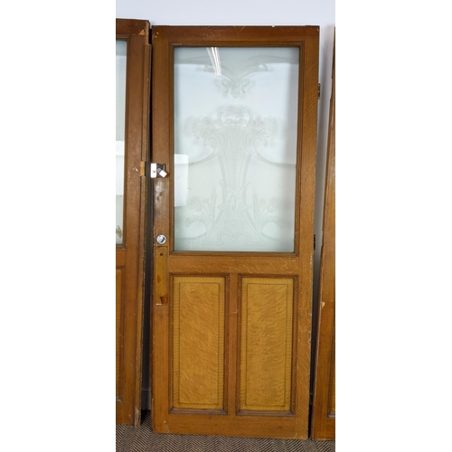 281 - DOOR PANELS, a set of three late 19th century Dutch, grain painted with Art Nouveau etched glass, ea... 