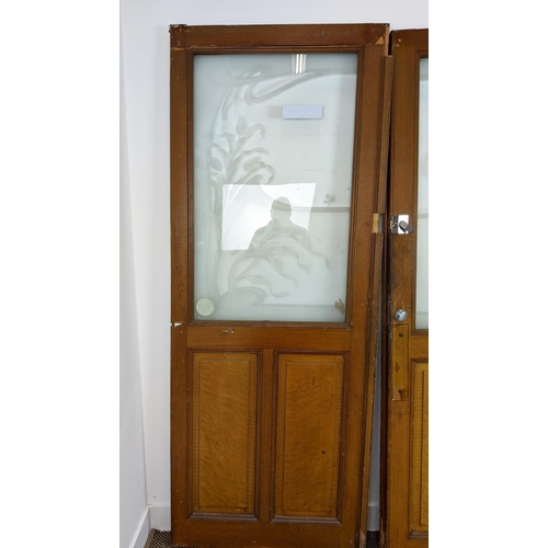 281 - DOOR PANELS, a set of three late 19th century Dutch, grain painted with Art Nouveau etched glass, ea... 