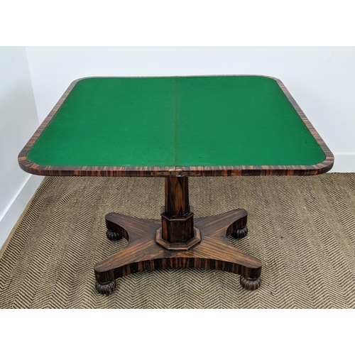 94 - CARD TABLE, Regency coromandel with green baize foldover top and brass castors, 74cm x 91cm W x 45cm... 