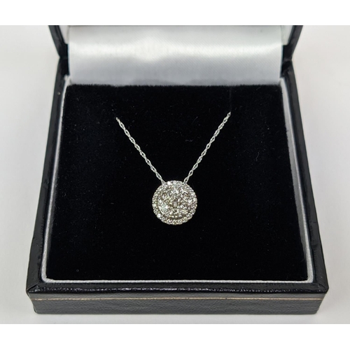 19 - A 9CT WHITE GOLD DIAMOND SET CLUSTER NECKLACE, set with round brilliant cut diamonds of approximatel... 