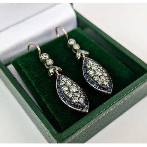 24 - A PAIR OF SILVER TOPPED 8CT ROSE GOLD PENDANT EARRINGS, with round brilliant cut diamonds and sapphi... 