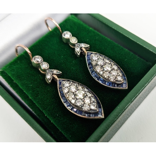 24 - A PAIR OF SILVER TOPPED 8CT ROSE GOLD PENDANT EARRINGS, with round brilliant cut diamonds and sapphi... 