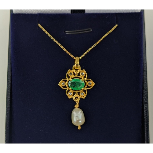 26 - A YELLOW METAL EMERALD AND PEARL SET PENDANT NECKLACE, gold plated chain, complete with box