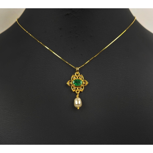 26 - A YELLOW METAL EMERALD AND PEARL SET PENDANT NECKLACE, gold plated chain, complete with box