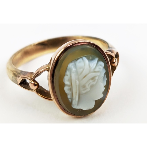 28 - A 9CT ROSE GOLD CAMEO DRESS RING, early 20th century, ring size M½, pierced setting, complete with b... 