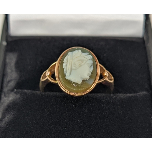 28 - A 9CT ROSE GOLD CAMEO DRESS RING, early 20th century, ring size M½, pierced setting, complete with b... 