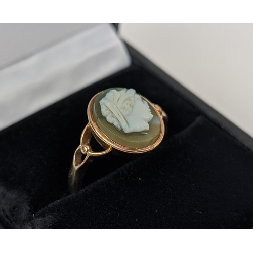 28 - A 9CT ROSE GOLD CAMEO DRESS RING, early 20th century, ring size M½, pierced setting, complete with b... 