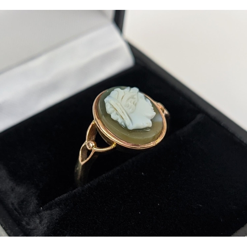 28 - A 9CT ROSE GOLD CAMEO DRESS RING, early 20th century, ring size M½, pierced setting, complete with b... 