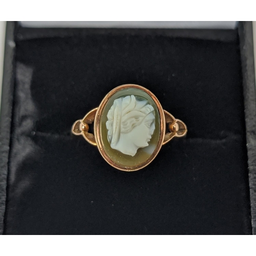 28 - A 9CT ROSE GOLD CAMEO DRESS RING, early 20th century, ring size M½, pierced setting, complete with b... 