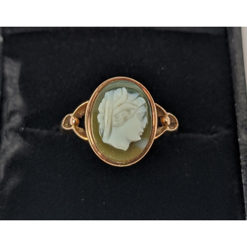 28 - A 9CT ROSE GOLD CAMEO DRESS RING, early 20th century, ring size M½, pierced setting, complete with b... 