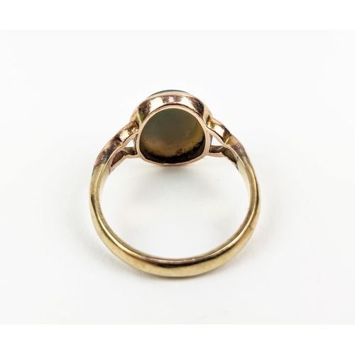 28 - A 9CT ROSE GOLD CAMEO DRESS RING, early 20th century, ring size M½, pierced setting, complete with b... 