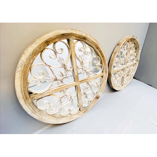305 - ARCHITECTURAL WALL MIRRORS, a pair, circular, distressed painted frames, 72cm diam. (2)