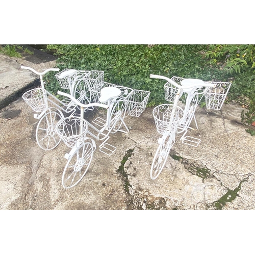 431 - BICYCLE PLANTERS,  a set of four, white painted, 63cm H x 88cm L x 44cm W. (4)