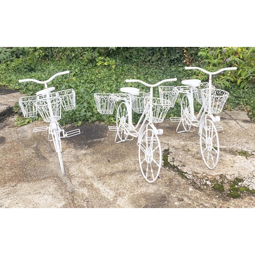 431 - BICYCLE PLANTERS,  a set of four, white painted, 63cm H x 88cm L x 44cm W. (4)