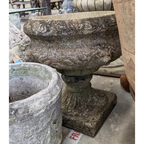 444 - THREE COMPOSITE STONE GARDEN ITEMS, including a bird bath 56cm H x 42cm W, pot 29cm H x 29cm W, and ... 