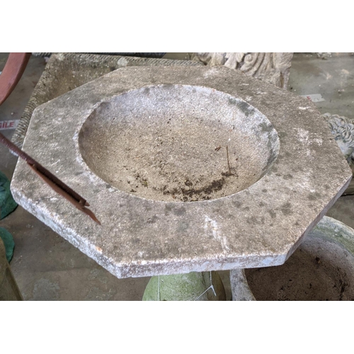 444 - THREE COMPOSITE STONE GARDEN ITEMS, including a bird bath 56cm H x 42cm W, pot 29cm H x 29cm W, and ... 