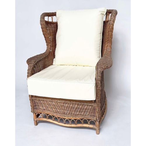 460 - CONSERVATORY ARMCHAIR, mid 20th century, rattan framed and cane woven with shaped back and cushions,... 