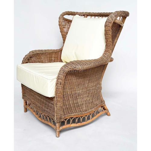 460 - CONSERVATORY ARMCHAIR, mid 20th century, rattan framed and cane woven with shaped back and cushions,... 