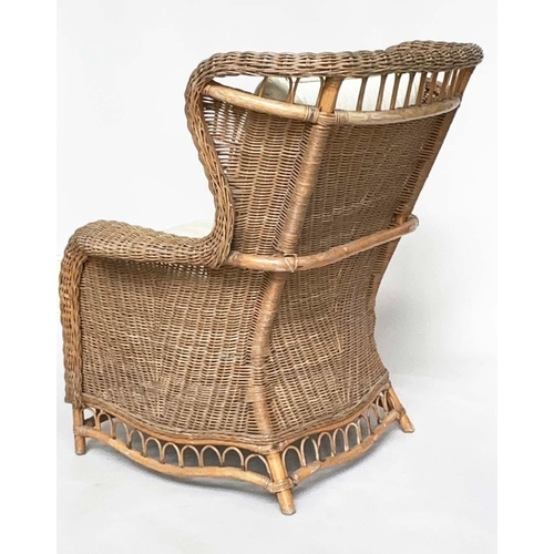 460 - CONSERVATORY ARMCHAIR, mid 20th century, rattan framed and cane woven with shaped back and cushions,... 