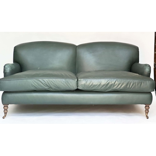 265 - HOWARD STYLE SOFA, natural soft green leather upholstered with turned supports, 95cm H x 210cm W x 1... 