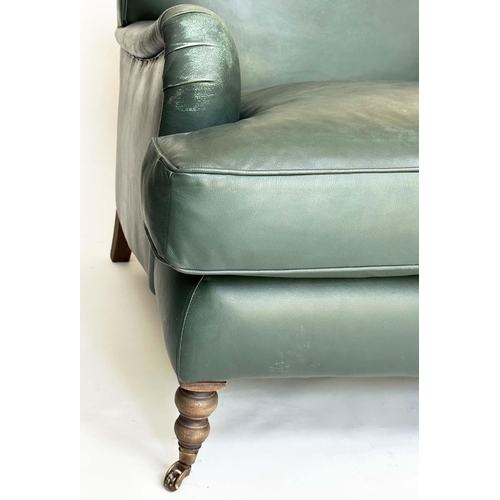 265 - HOWARD STYLE SOFA, natural soft green leather upholstered with turned supports, 95cm H x 210cm W x 1... 