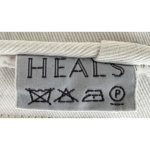 259 - HEALS CONSERVATORY ARMCHAIRS, a pair, rattan framed and cane woven panelled with rounded backs and c... 