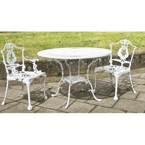 255 - GARDEN TABLE AND CHAIRS, Victorian style distressed white painted, circular with two associated side... 