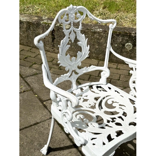 255 - GARDEN TABLE AND CHAIRS, Victorian style distressed white painted, circular with two associated side... 