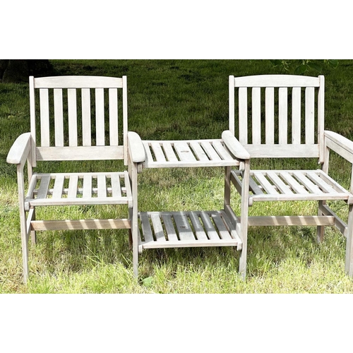 257 - GARDEN CONVERSATION BENCH, well weathered teak, two armchairs with conjoining table, 162cm W.