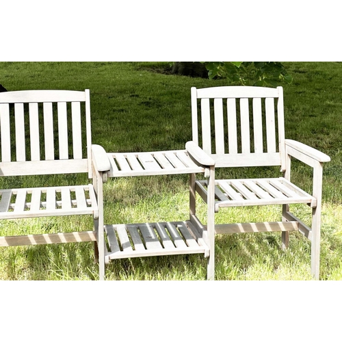 257 - GARDEN CONVERSATION BENCH, well weathered teak, two armchairs with conjoining table, 162cm W.