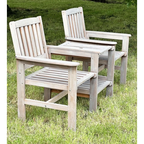 257 - GARDEN CONVERSATION BENCH, well weathered teak, two armchairs with conjoining table, 162cm W.