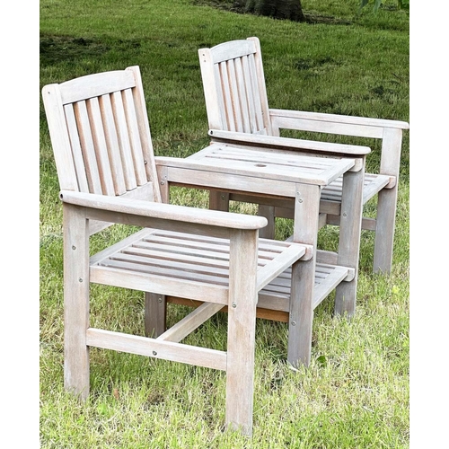 257 - GARDEN CONVERSATION BENCH, well weathered teak, two armchairs with conjoining table, 162cm W.