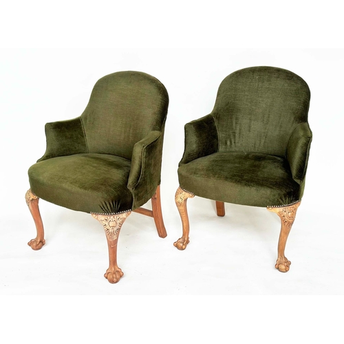 106 - ARMCHAIRS, a pair, early 20th century tub-form moss green velvet upholstered with carved walnut cabr... 