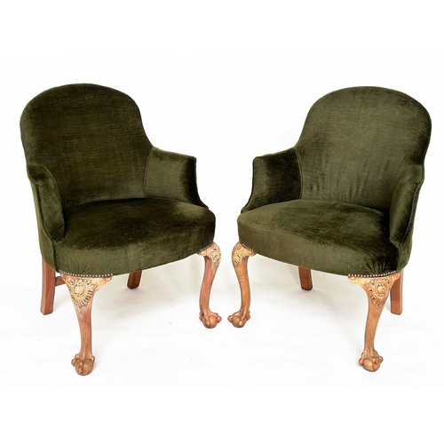 106 - ARMCHAIRS, a pair, early 20th century tub-form moss green velvet upholstered with carved walnut cabr... 