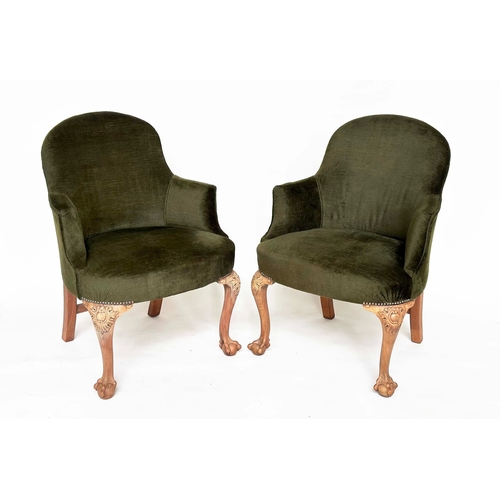 106 - ARMCHAIRS, a pair, early 20th century tub-form moss green velvet upholstered with carved walnut cabr... 