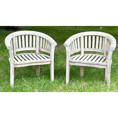 146 - BANANA GARDEN ARMCHAIRS, a pair, well weathered teak, slatted with rounded backs, 82cm H x 78cm W. (... 