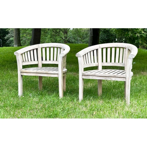 146 - BANANA GARDEN ARMCHAIRS, a pair, well weathered teak, slatted with rounded backs, 82cm H x 78cm W. (... 