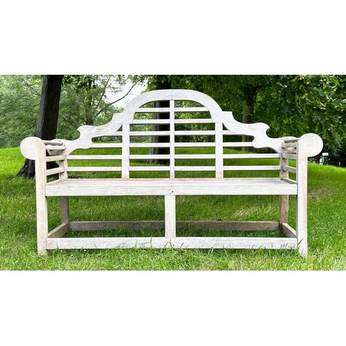 148 - LUTYENS STYLE GARDEN BENCH, well weathered teak after the design by Sir Edwin Lutyens with arched ba... 