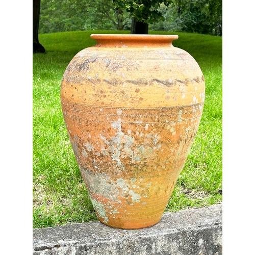 151 - GARDEN TERRACOTTA AMPHORA URN, weathered with all over impressed decoration, 65cm H x 46cm W.