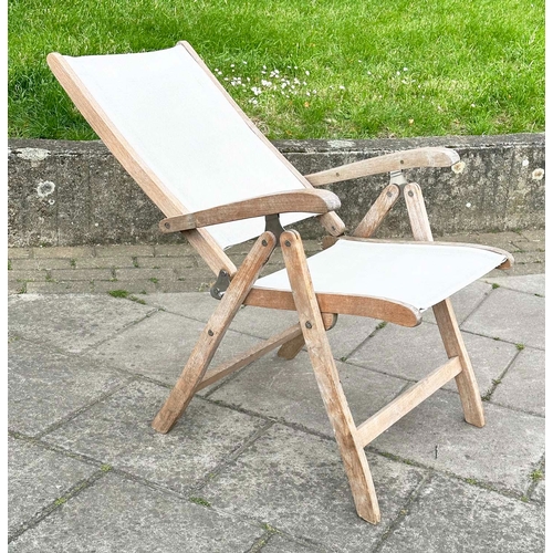 153 - GARDEN FOLDING ARMCHAIRS BY NEPTUNE, a set of six, weathered teak and all weather canvas by Neptune,... 