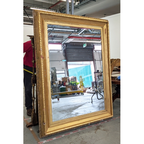 169 - WALL MIRROR, of substantial proportions with a 19th century gilt frame and a bevelled modern plate, ... 