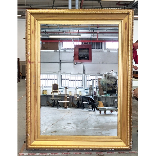 169 - WALL MIRROR, of substantial proportions with a 19th century gilt frame and a bevelled modern plate, ... 