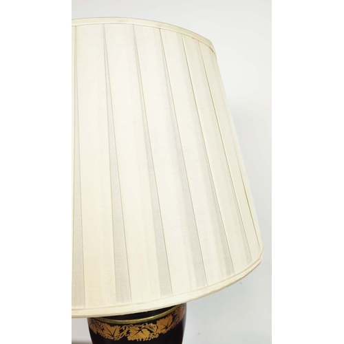 174 - TABLE LAMPS, a pair, Regency style toleware, black with gilt highlights and pleated shades, 70cm H. ... 