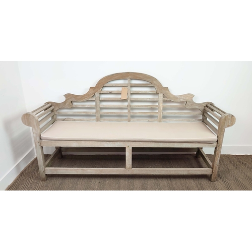 185 - GARDEN BENCH, Lutyens style in weathered teak, 196cm L x 105cm H, with cushion.